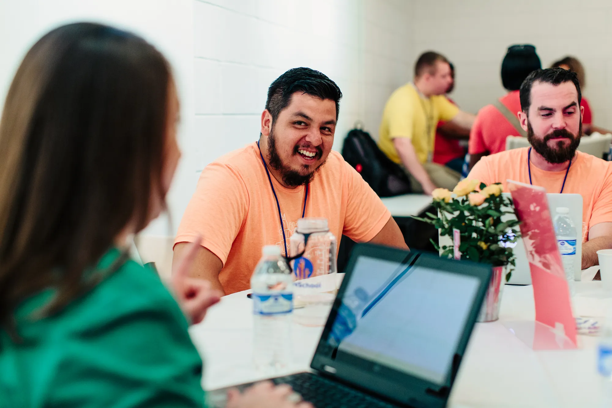 Educators talking and laughing together at a LiveSchool Summit